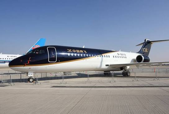 COMAC regional aircraft on an outdoor apron