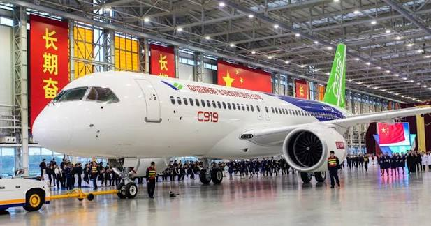 COMAC C919 aircraft in a final assembly hangar